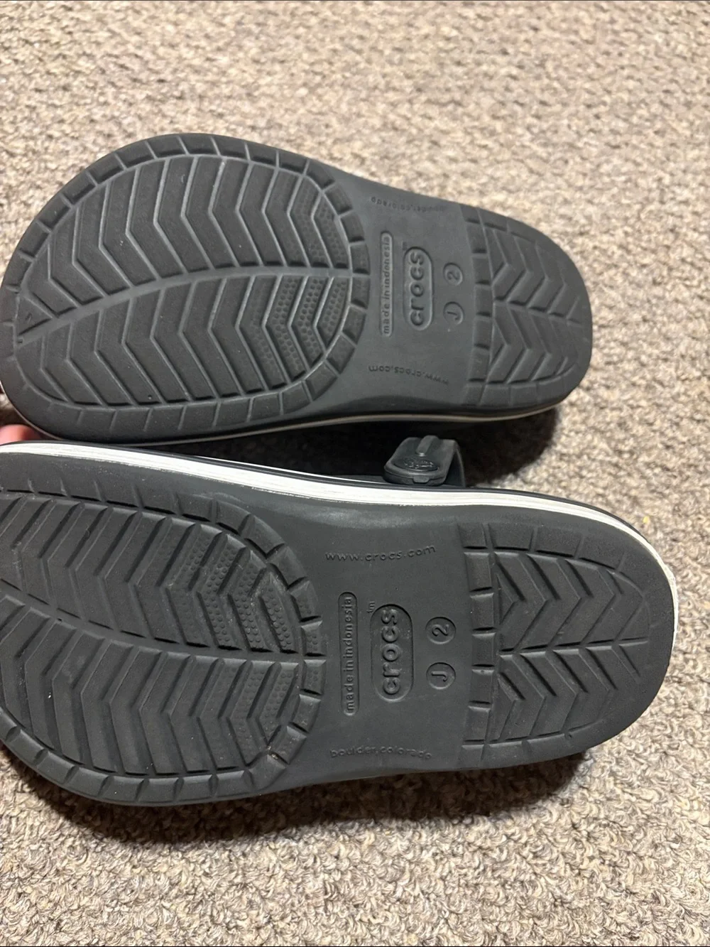 CROCS Kids Black Slip-On Clogs with White Trim